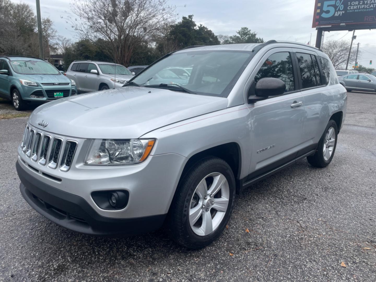 2012 SILVER JEEP COMPASS SPORT (1C4NJCBA8CD) with an 2.0L engine, Continuously Variable transmission, located at 5103 Dorchester Rd., Charleston, SC, 29418-5607, (843) 767-1122, 36.245171, -115.228050 - Spacious Interior with CD/AUX/AM/FM, Hands-free Phone, Power Windows, Power Locks, Power Windows, Power Mirrors, Keyless Entry, Alloy Wheels. Local Trade-in!! 108k miles Located at New Life Auto Sales! 2023 WINNER for Post & Courier's Charleston's Choice Pre-owned Car Dealer AND 2018-2024 Top 5 Fin - Photo#2